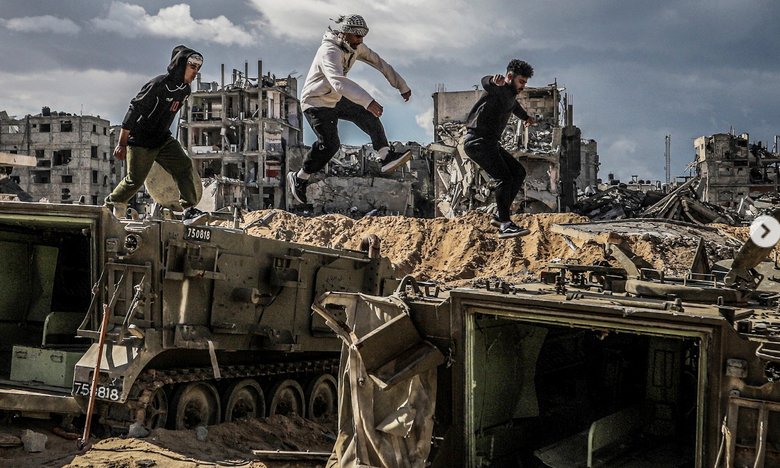 Destroyed Israeli Tank Becomes a Toy for Children in Gaza